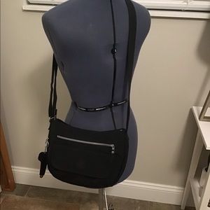 Kipling black crossbody purse lots of pockets